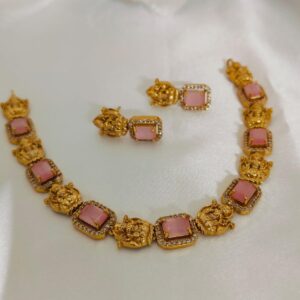 simple pastel pink set with lakshmi motifs